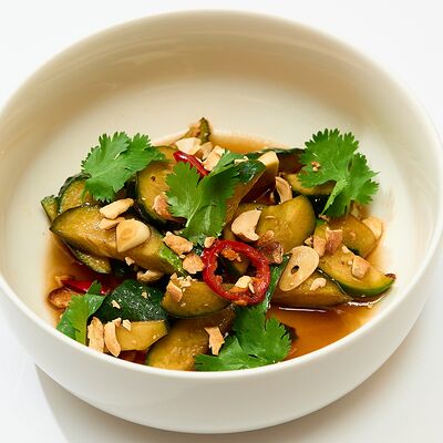 Битые огурцы с кинзой и кешью в One Special по цене 470 ₽