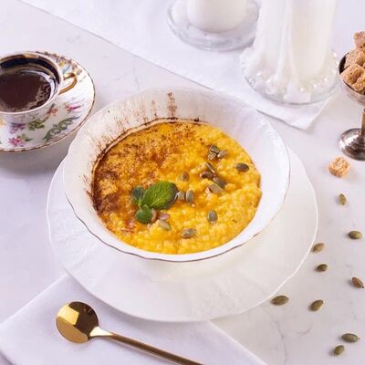 Пшенная каша с тыквой, медом и корицей в Лобби бар по цене 540 ₽