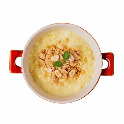 Каша пшенная молочная с халвой в Азбука Вкуса Экспресс Меню по цене 175 ₽