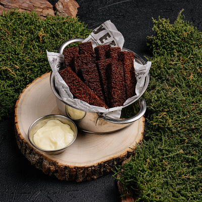 Гренки бородинские с чесночным соусомв Реконструкция по цене 290 ₽