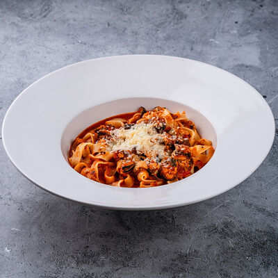 Паста томатная с мидиями в Мидийное место по цене 890 ₽