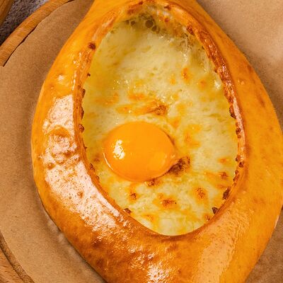 Хачапури по-аджарски в Омар Хайям по цене 530 ₽