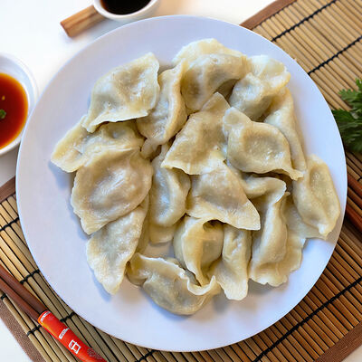 Пельмени со свининой вареные в Wai Mai по цене 550 ₽