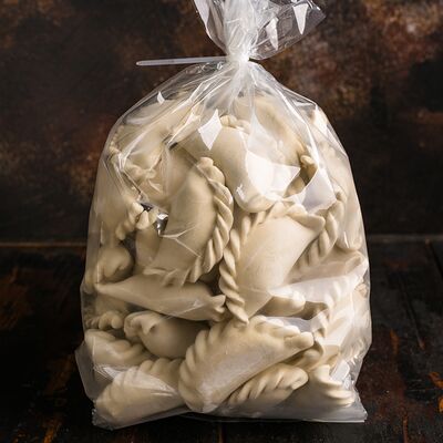 Вареники с квашенной капустой и картошкойв Неспешник по цене 975 ₽