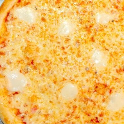 Пицца Маргарита с молодым сыром в Marfino Delivery по цене 570 ₽