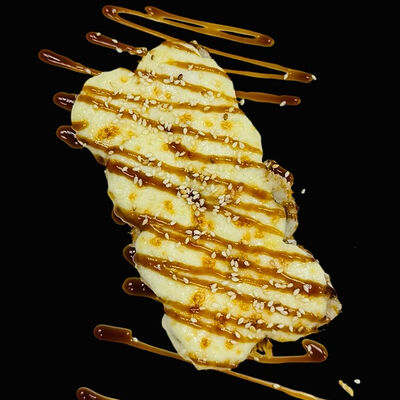 Запеченный ролл Бонито в Kaikan по цене 635 ₽