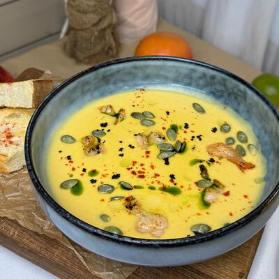 Тыквенный крем-суп с креветками в Pro Вкус по цене 560 ₽