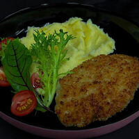 Свиная котлета с картофельным пюре в Ostroff