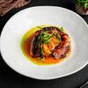 Осьминог на подушке из ромеско с печеным картофелем в Дикий улов по цене 1800