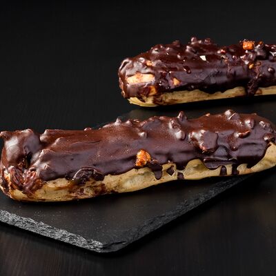 Эклер с заварным кремом в Пекарня Буханка по цене 179 ₽