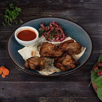 Шашлык из cвинoй шейки в Ассадо по цене 510 ₽