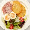 Картофельные хашбрауны с окороком, яйцом, сметаной и томатамив Коза Тапас по цене 595