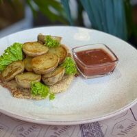 Шницель по-милански с картофелем бейби в Моне