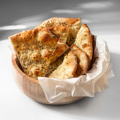 Неаполитанская фокачча с песто и пармезаном в Sunrise по цене 228 ₽