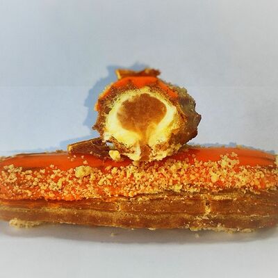 Эклер с мандарином в Кусай эклер по цене 286 ₽