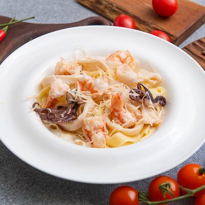 Паста с морепродуктами в Звёздная ночь по цене 800 ₽