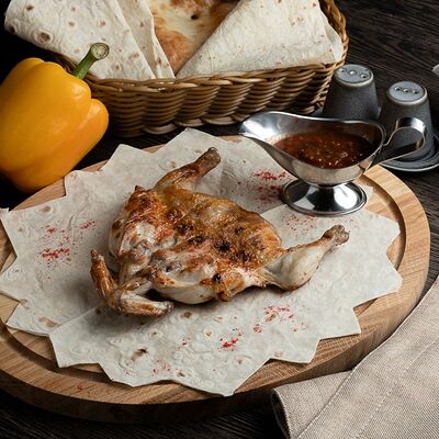 Цыпленок на гриле в Огонекшашлыки на углях по цене 600 ₽