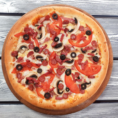 Пицца Ассорти в Гиро пицца халяль по цене 462 ₽