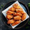 Куриные крылышки в соусе BBQ острые в ПИКНИК 24/7 по цене 770