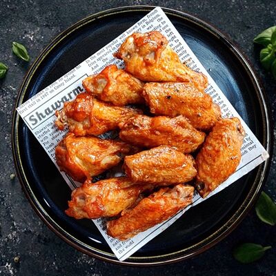 Куриные крылышки в соусе BBQ острые в ПИКНИК 24/7 по цене 770 ₽