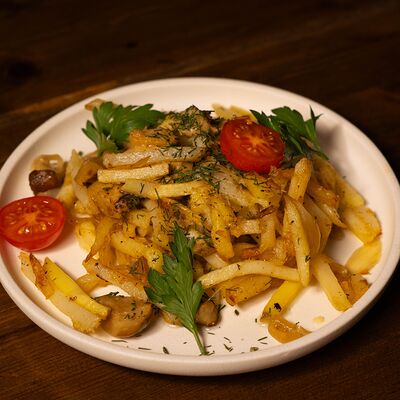 Жареная картошка с белыми грибами в Серебряная Fabrika по цене 480 ₽