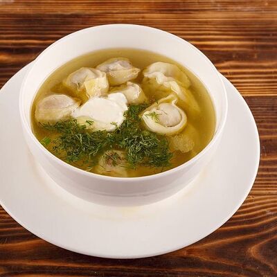 Пельмени с бульоном в Байхан по цене 160 ₽