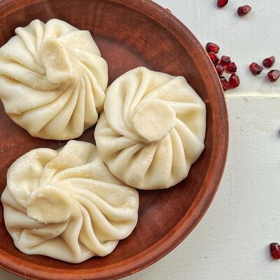 Хинкали с креветками в соусом Том Ямв Джорджия по цене 510 ₽