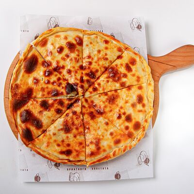 Осетинский пирог с картофелем и сыром (25 см) в Ched по цене 550 ₽