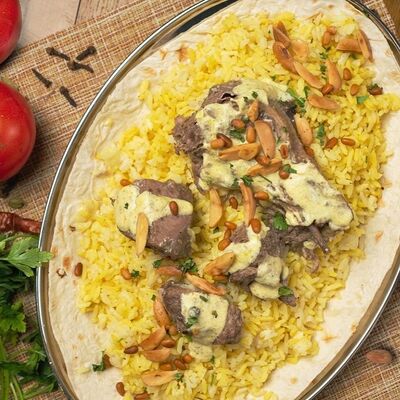 Мансаф с бараниной в Кафе Аль-карамарабская кухня по цене 990 ₽
