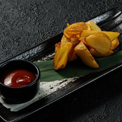 Картофельные дольки в Umami Ramen Club по цене 351 ₽