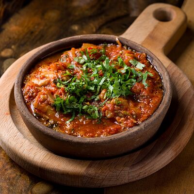 Чахохбили из курицы в SULUGUNI по цене 931 ₽