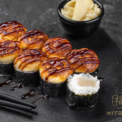 Запеченный ролл с гребешком в Kitana по цене 910 ₽