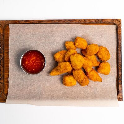 Курица карааге в Harats pub по цене 560 ₽