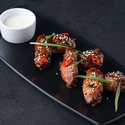 Крылья BBQ в Corner Grill по цене 620 ₽