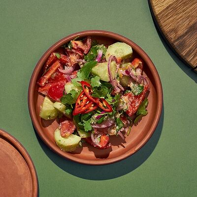 Салат по-тбилисски в Хачапури и вино по цене 273 ₽