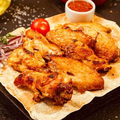 Шашлык из куриных крыльев в Шашлычный Домик по цене 450 ₽