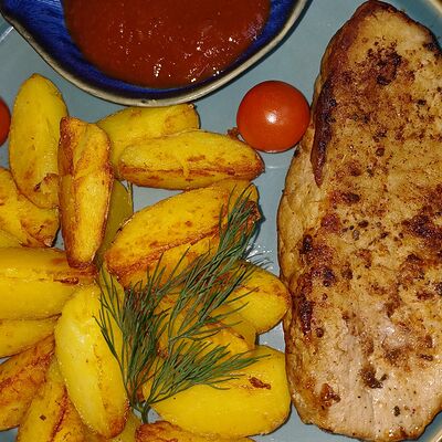 Отбивная из свинины с картофелем бейби в Осетринка по цене 550 ₽