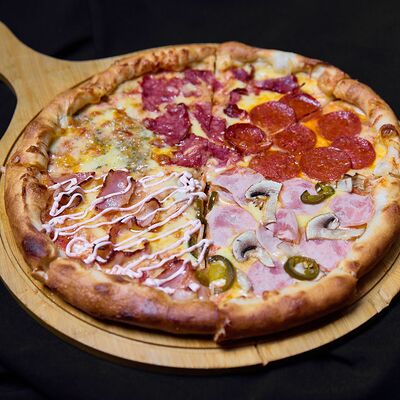 Пицца ассорти в Эндорфин по цене 1550 ₽