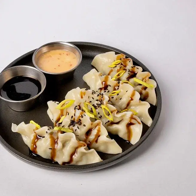 Гёдза с курицей и креветками в Мидийный дом по цене 828 ₽