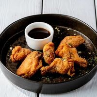 Крылья куриные, жаренные во фритюре в Перчини на огне