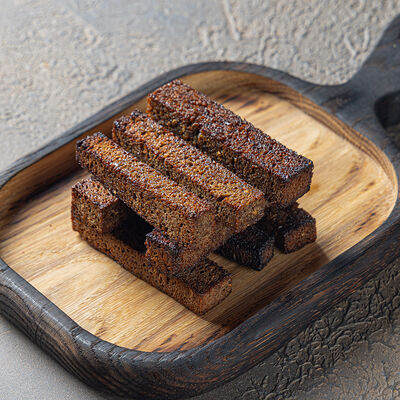 Гренки с чесноком в Дикий койот по цене 310 ₽