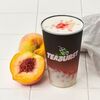 Персиковый холодный напиток со льдом и пенкой в Teaburst bubble tea по цене 400