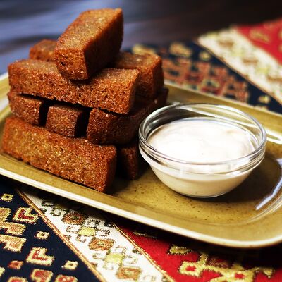 Ржаные гренки с чесноком в Золотой Кувшин по цене 300 ₽