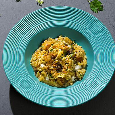 Орзо с белыми грибами, сморчками и песто в Yami Yami по цене 850 ₽