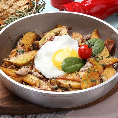 Сковородка со свининой в Caffe la vita по цене 600 ₽