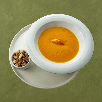 Тыквенный суп-пюре с креветками в Шашлычара по цене 550 ₽