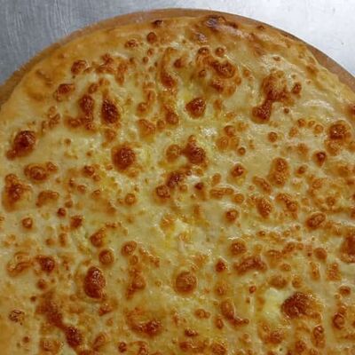 Осетинский пирог с сыром и шпинатом в Алазани по цене 830 ₽