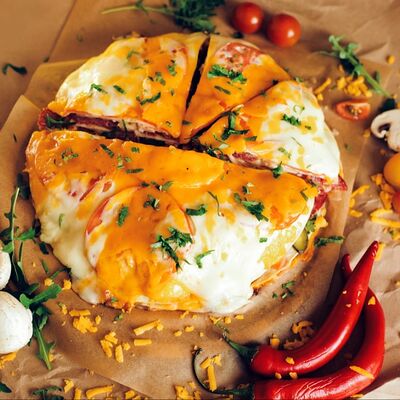Четырехслойная пицца Ассорти в Monsterpizzz по цене 1595 ₽
