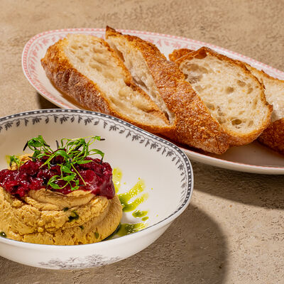 Паштет утиный с конфи из подкопченной брусники в Cafe Sisi по цене 670 ₽