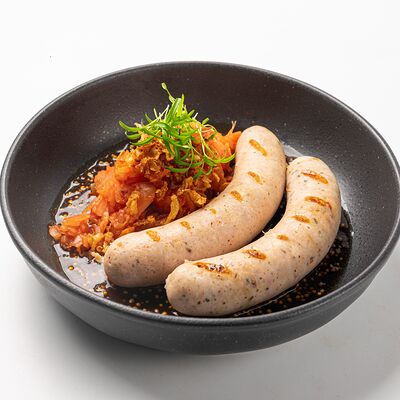 Пикантные колбаски с тушёной капустой и дижонским соусом в Финнеганс Вейк по цене 840 ₽